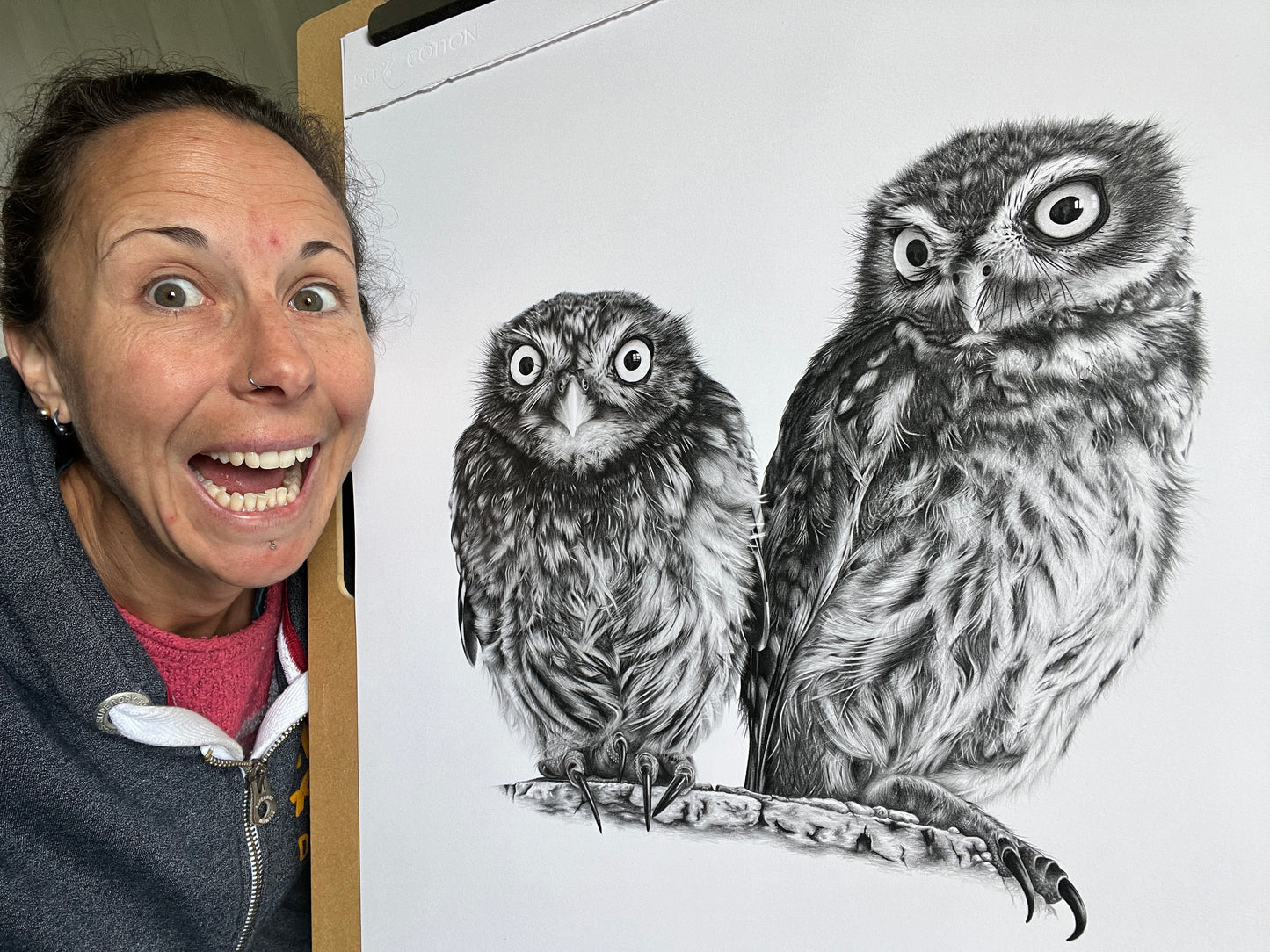 Emma Timmis with owl drawing